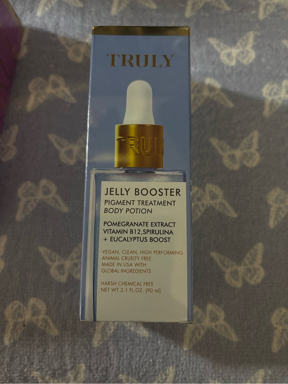 TRULY Jelly Booster Pigment Treatment Body Potion - Light Blue & Gold Accents